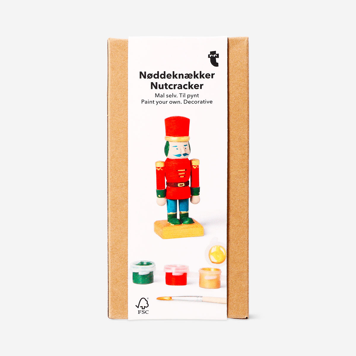 DIY wooden nutcracker hobby kit by Flying Tiger Copenhagen with natural wood finish and intricate nutcracker design.
