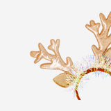 Reindeer hairband with antlers for party, featuring plush reindeer design and festive details by Flying Tiger Copenhagen.
