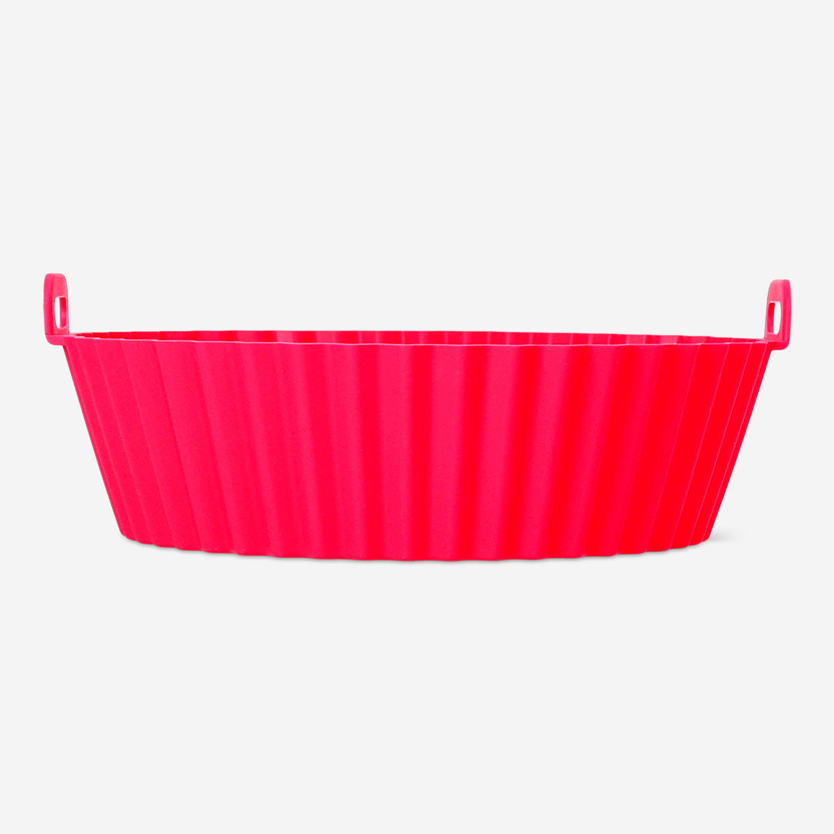 Round 20cm air fryer liner from Flying Tiger Copenhagen, non-stick kitchen accessory for easy air fryer basket cleaning.
