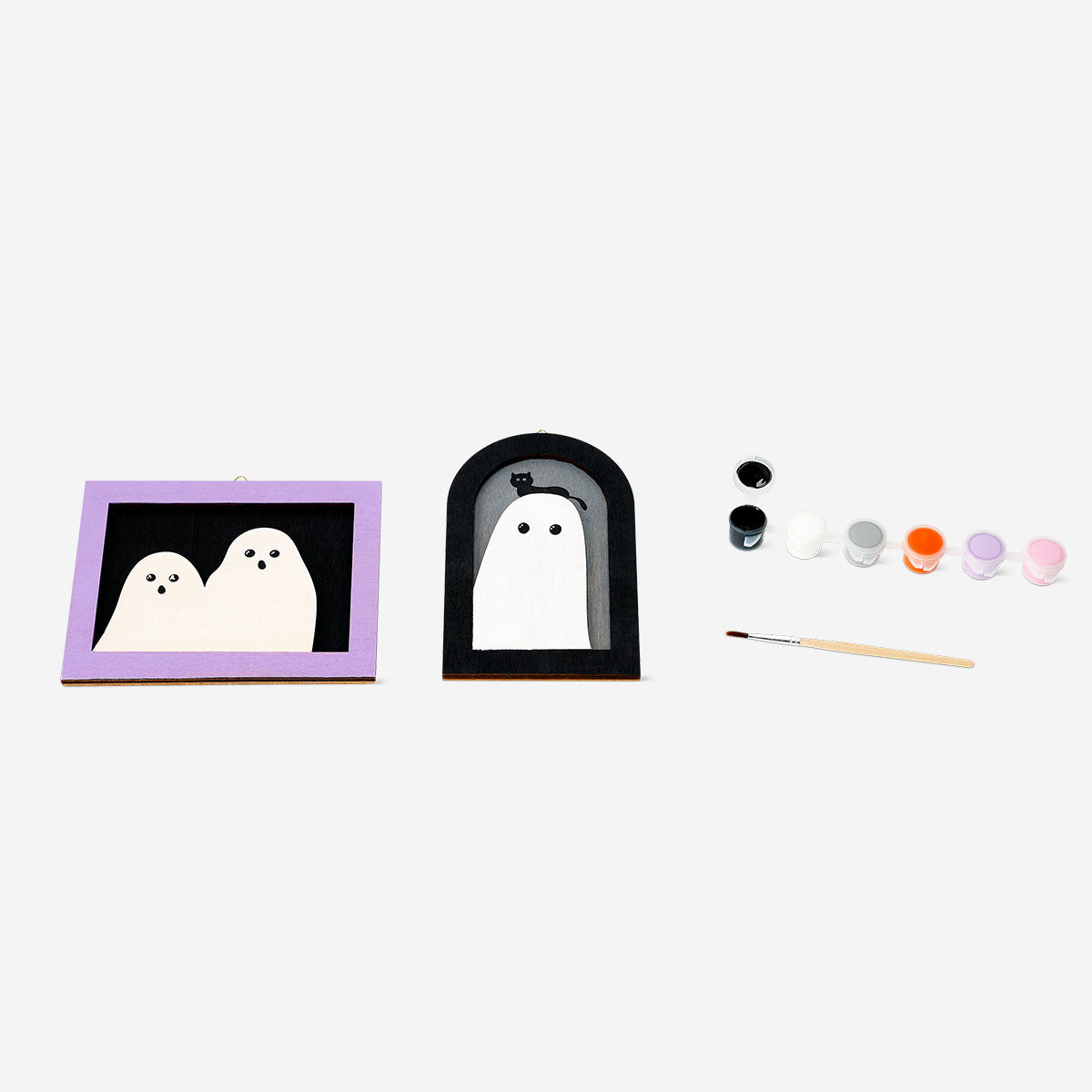 DIY wooden ghost craft kit by Flying Tiger Copenhagen, featuring painted wooden ghost with craft supplies for hobby projects.