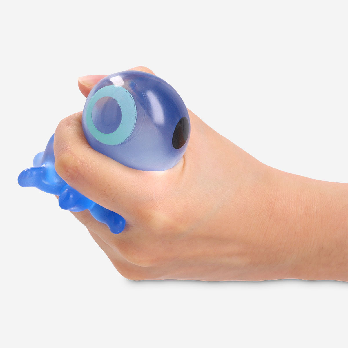 Blue octopus Press Me toy gadget from Flying Tiger Copenhagen, with soft tentacles and a friendly face, designed for tactile fun.
