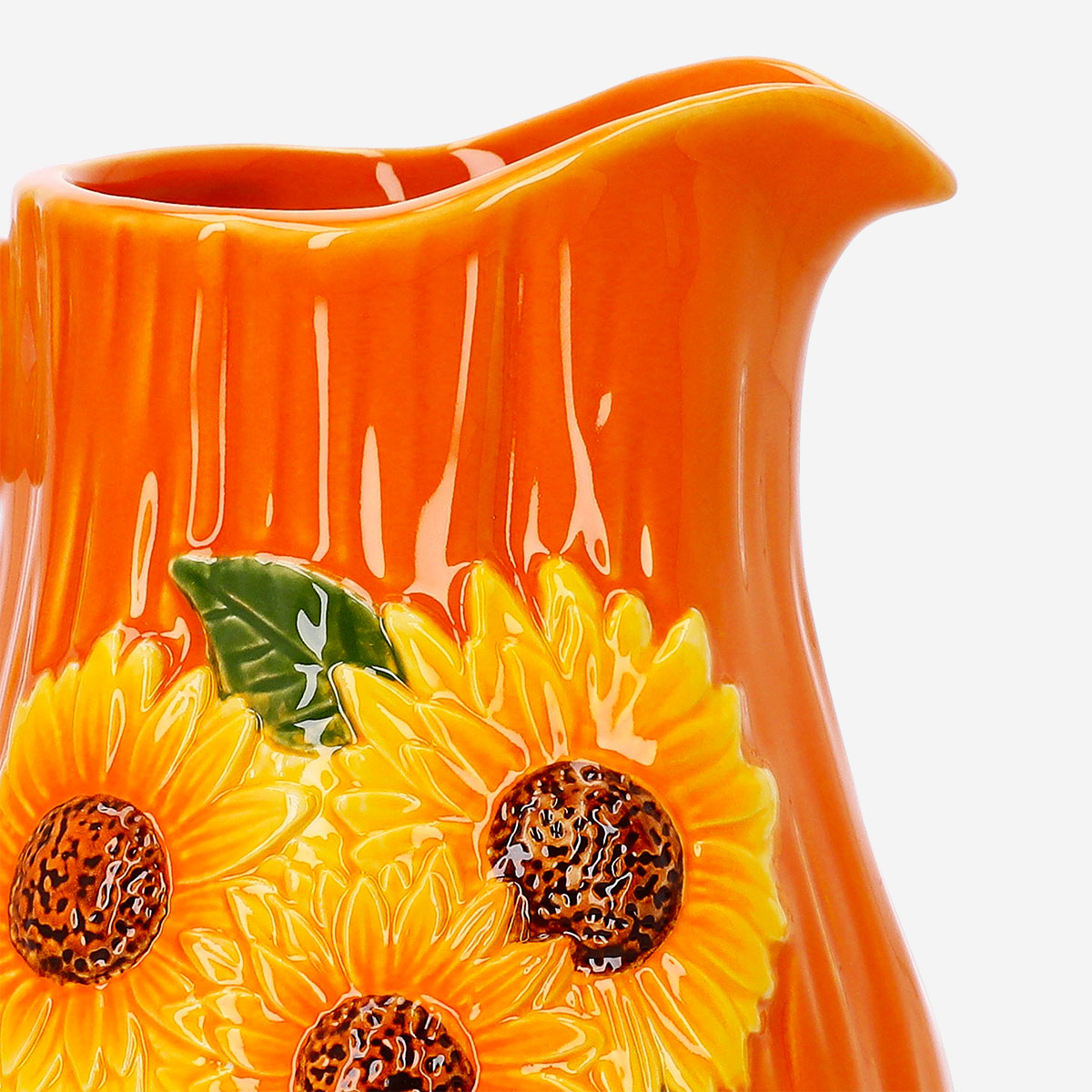 Ceramic kitchen jug with embossed sunflower design, 1.12L capacity, by Flying Tiger Copenhagen, featuring a glossy finish and artistic pattern.