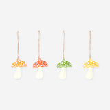 Set of four decorative felt mushrooms for hanging, ideal for party decor, from Flying Tiger Copenhagen.