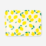 Decorative home tray with lemon print, 22x31 cm, from Flying Tiger Copenhagen, featuring bright yellow lemon illustrations.
