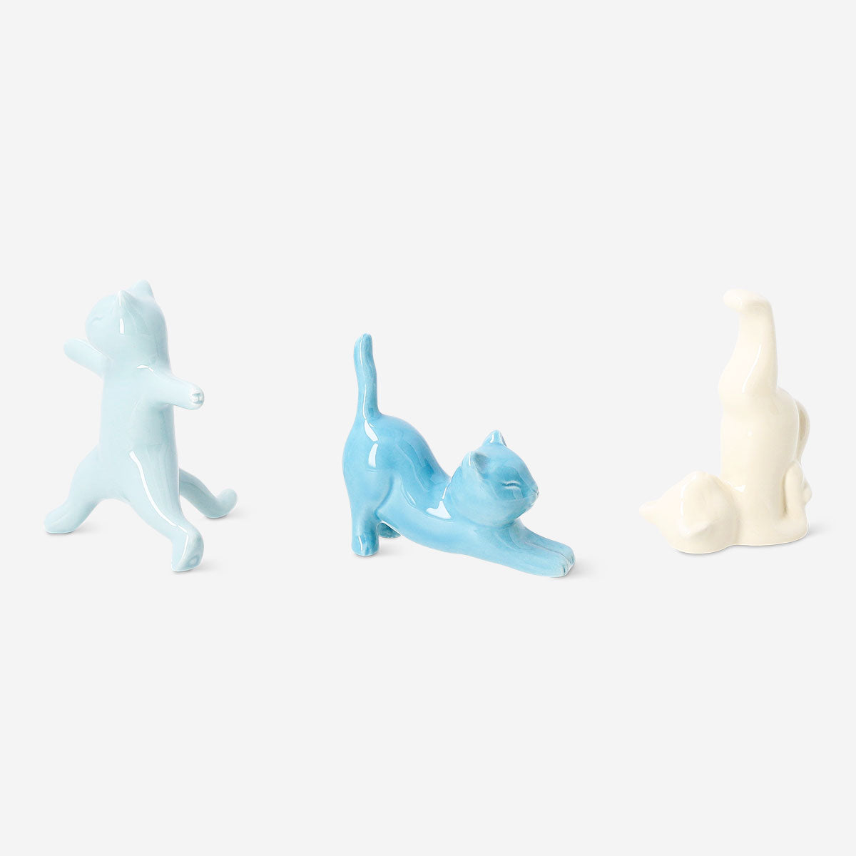 Set of three blue ceramic cat jewelry stands from Flying Tiger Copenhagen, decorative home accessories for organizing jewelry.