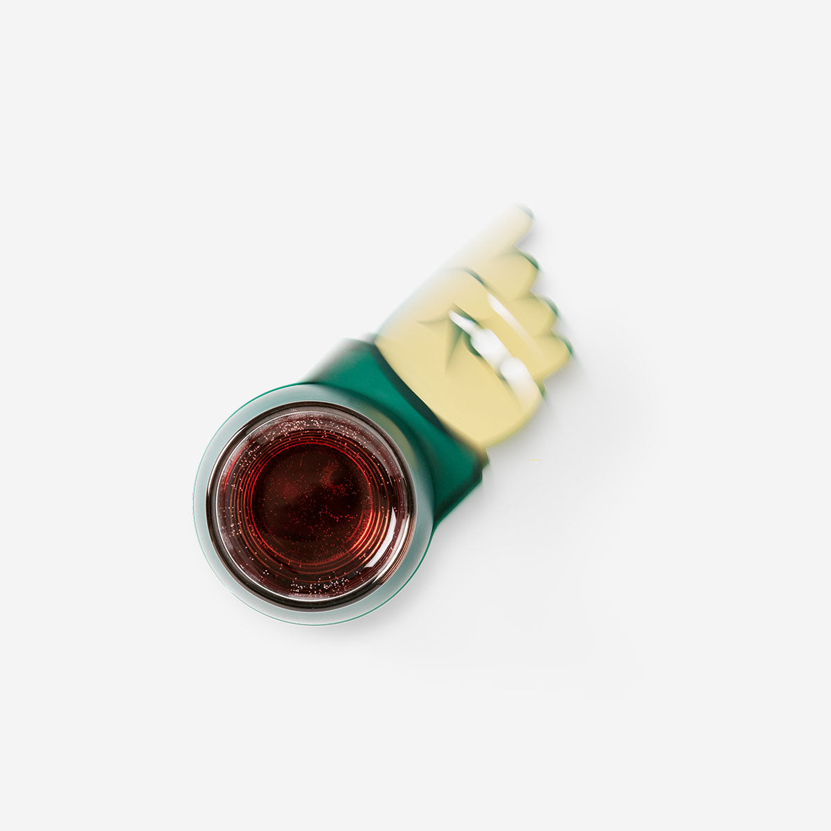 Flying Tiger Copenhagen shot spinner game gadget with colorful spinning top and playful design on a white background.
