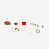 Set of four DIY wooden Christmas ornaments for crafting, featuring natural wood finish and holiday holiday designs from Flying Tiger Copenhagen