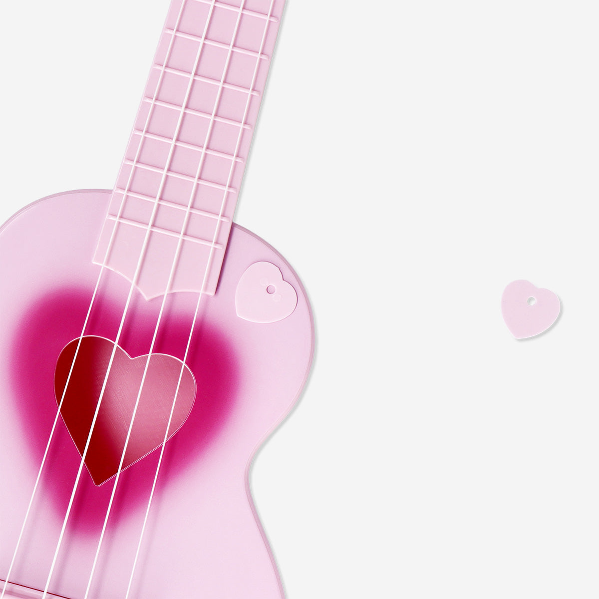 Pink ukulele with heart cut out