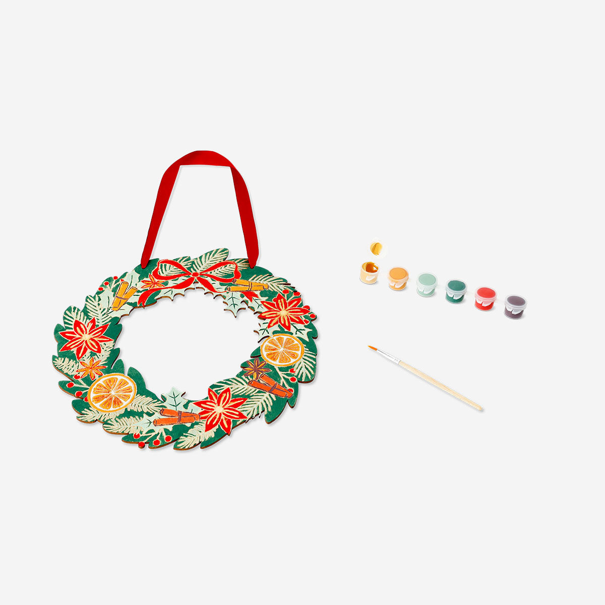 DIY wooden wreath for hobby crafting, featuring natural wood rings and decorative elements, by Flying Tiger Copenhagen.