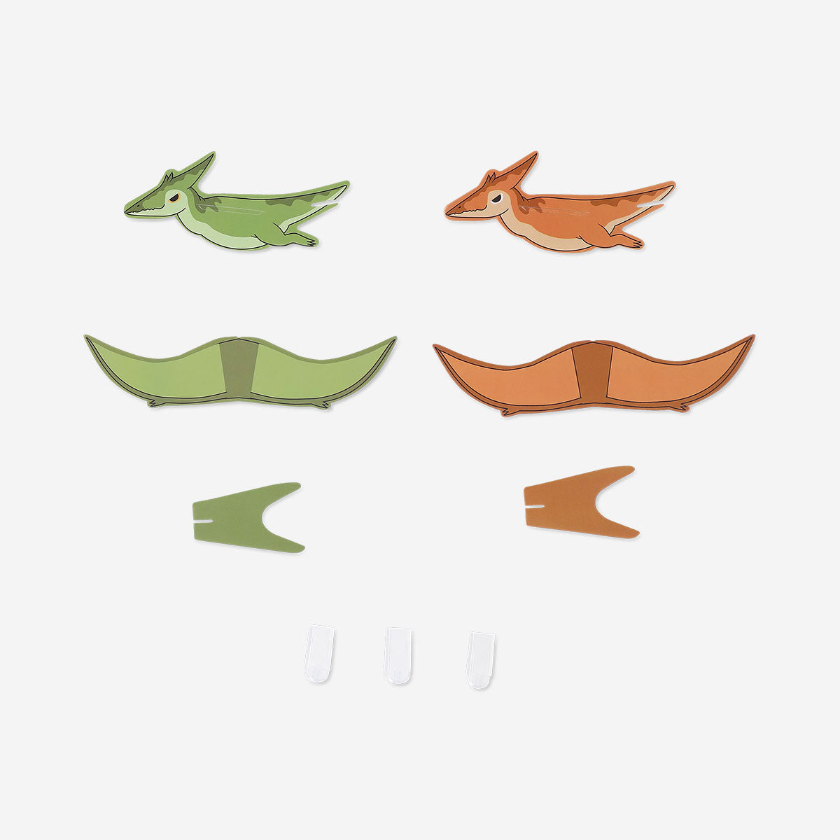 Set of three DIY flying dinosaur toys from Flying Tiger Copenhagen, colorful plastic models for creative play.