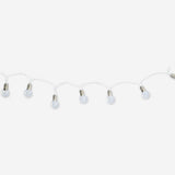Outdoor string lights with clear bulbs from Flying Tiger Copenhagen, perfect for illuminating outdoor spaces and adding ambient charm.