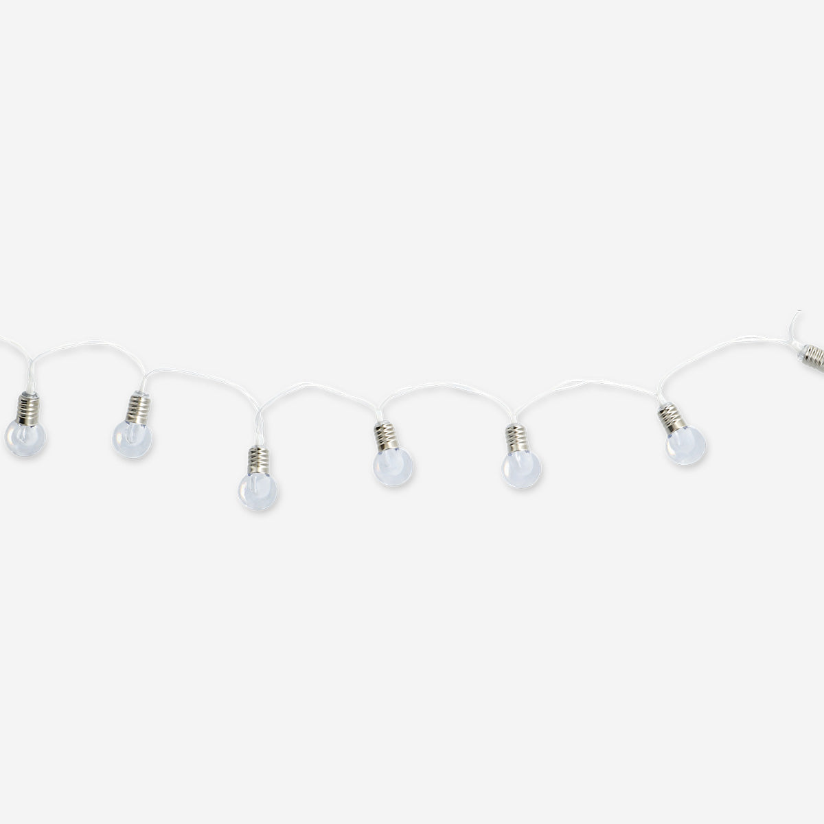 Outdoor string lights with clear bulbs from Flying Tiger Copenhagen, perfect for illuminating outdoor spaces and adding ambient charm.