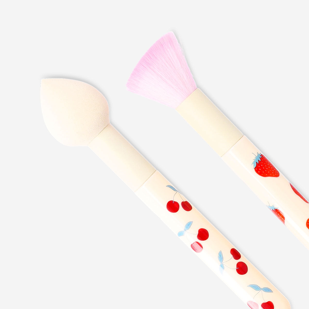 Set of two Flying Tiger Copenhagen makeup brushes with berry print for personal care, featuring soft bristles and stylish design.