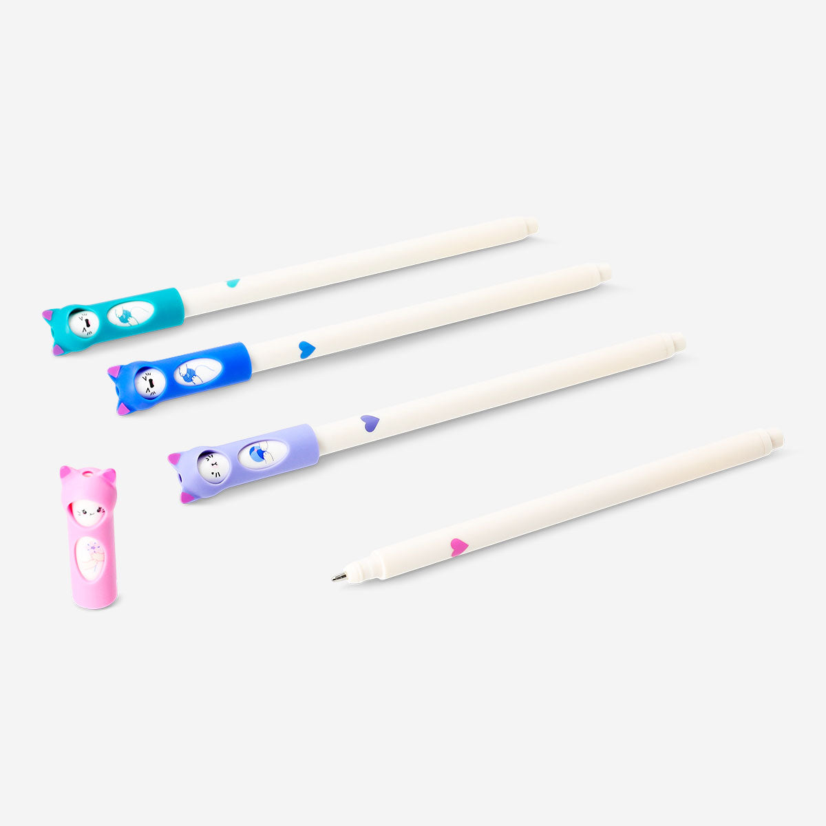 Set of four Glitter gel pens with playful cat toppers from Flying Tiger Copenhagen, ideal for office or creative writing.