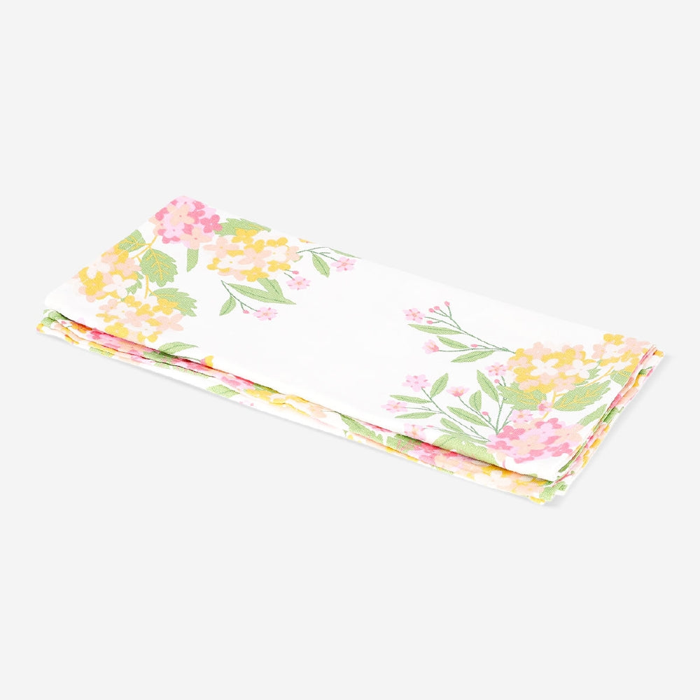 Floral table runner from Flying Tiger Copenhagen, 35x130 cm, with colorful flower pattern on fabric for home decor.