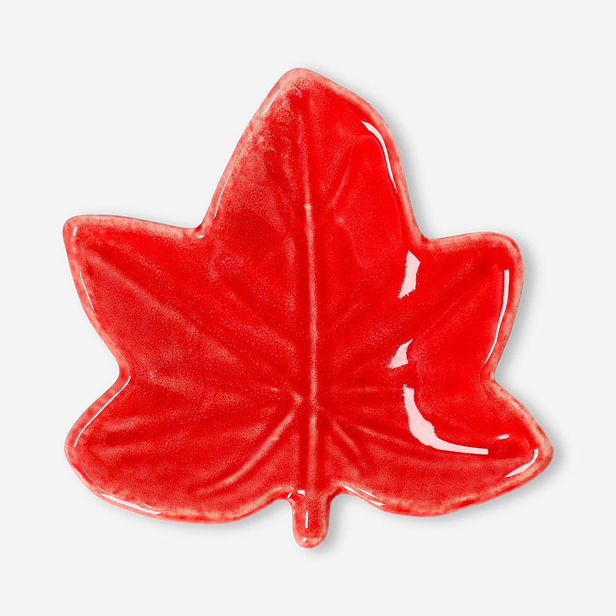Flying Tiger Copenhagen autumn leaf trinket tray for home decor, featuring a decorative leaf-shaped design in warm fall colors.