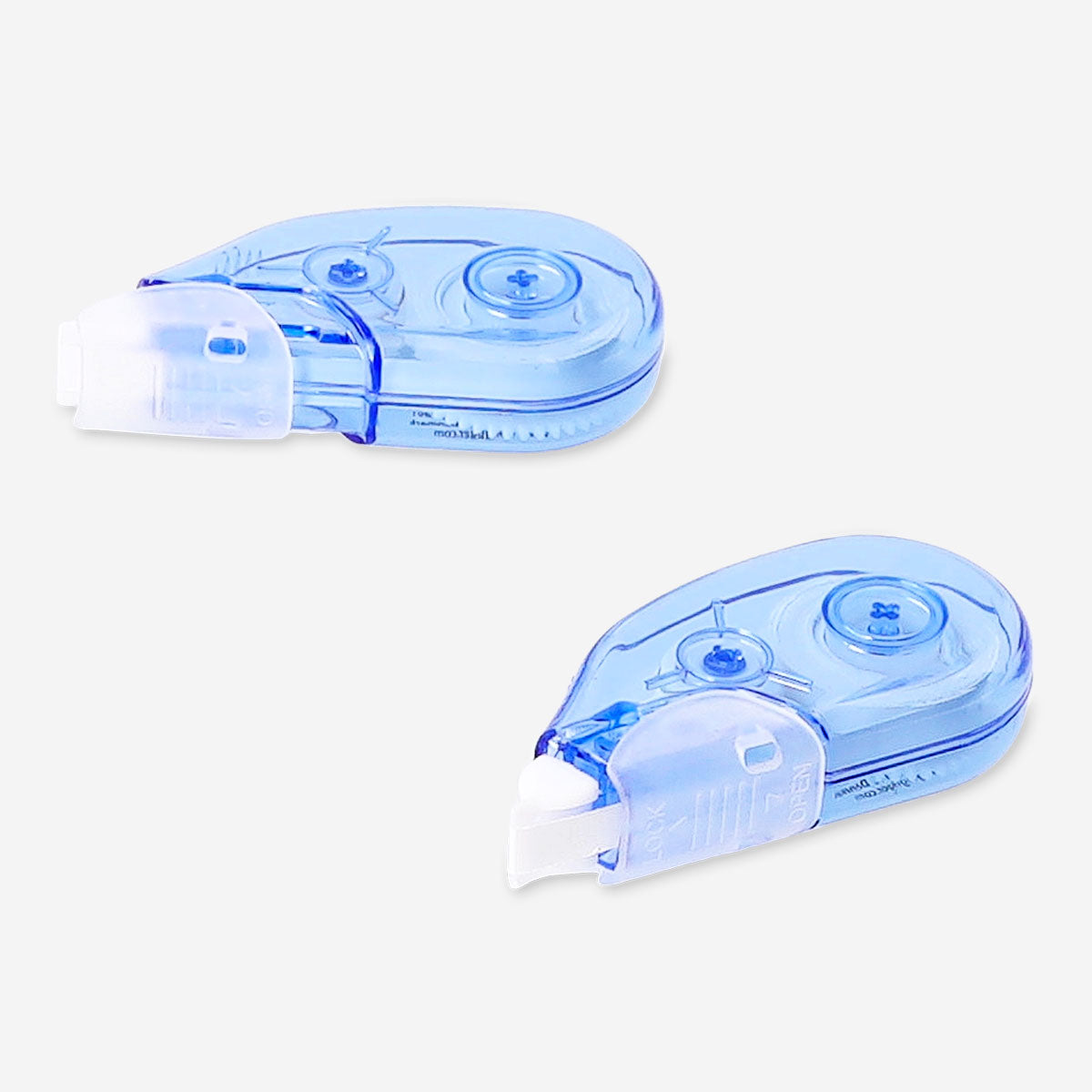 Two Flying Tiger Copenhagen correction tape pens for office use, with white tape and colorful casing, ideal for quick corrections.