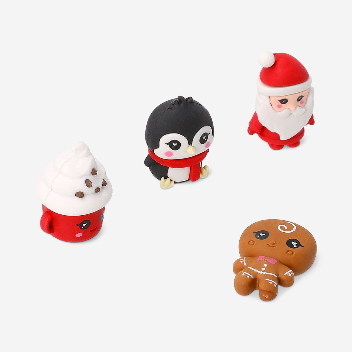 Set of four Flying Tiger Copenhagen Christmas character erasers, colorful office supplies shaped like festive holiday figures.