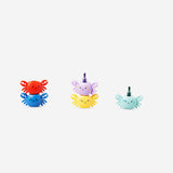Set of four Flying Tiger Copenhagen stackable crab highlighters for office use, featuring colorful crab designs and ergonomic tips.