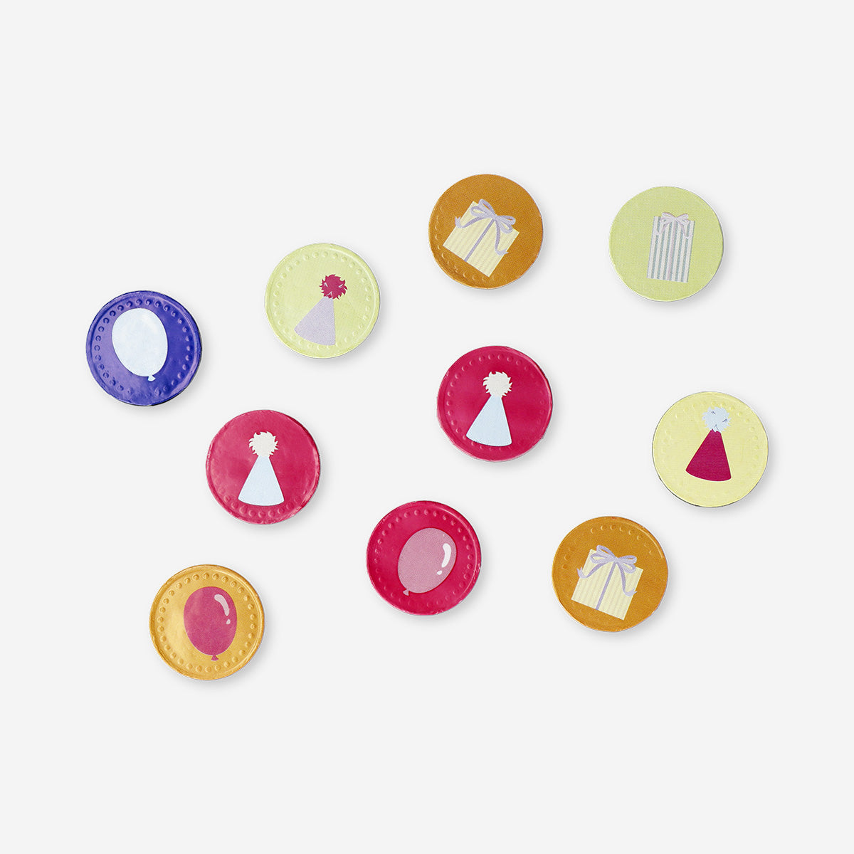 Birthday themed chocolate coins in a net from Flying Tiger Copenhagen, colorful foil-wrapped candies for celebrations.