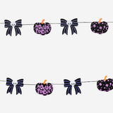 Halloween felt garland with pumpkins and bows, 300 cm, from Flying Tiger Copenhagen, decorated with festive orange and black felt pumpkins.