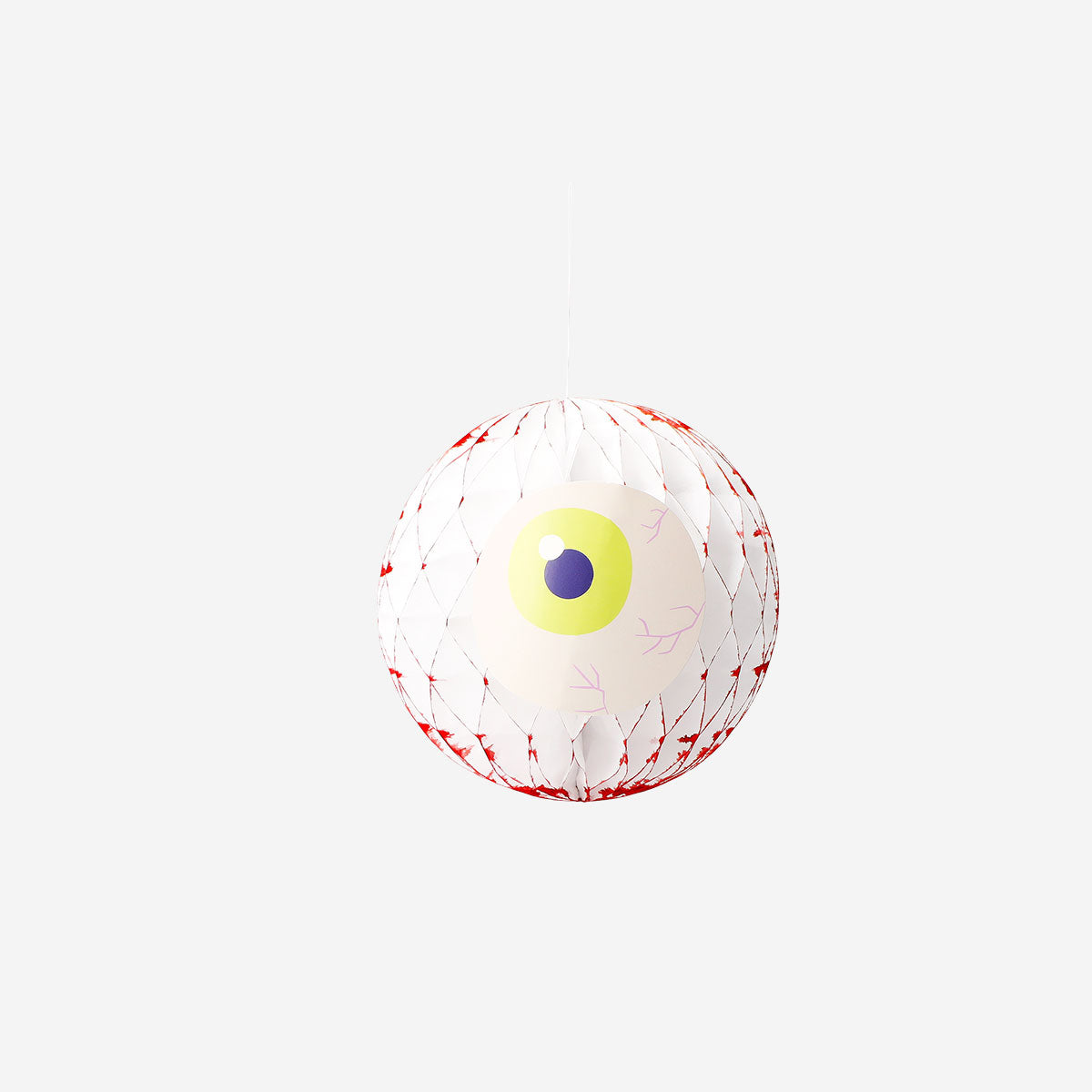 Three honeycomb paper eye decorations for hanging, colorful party decorations by Flying Tiger Copenhagen.