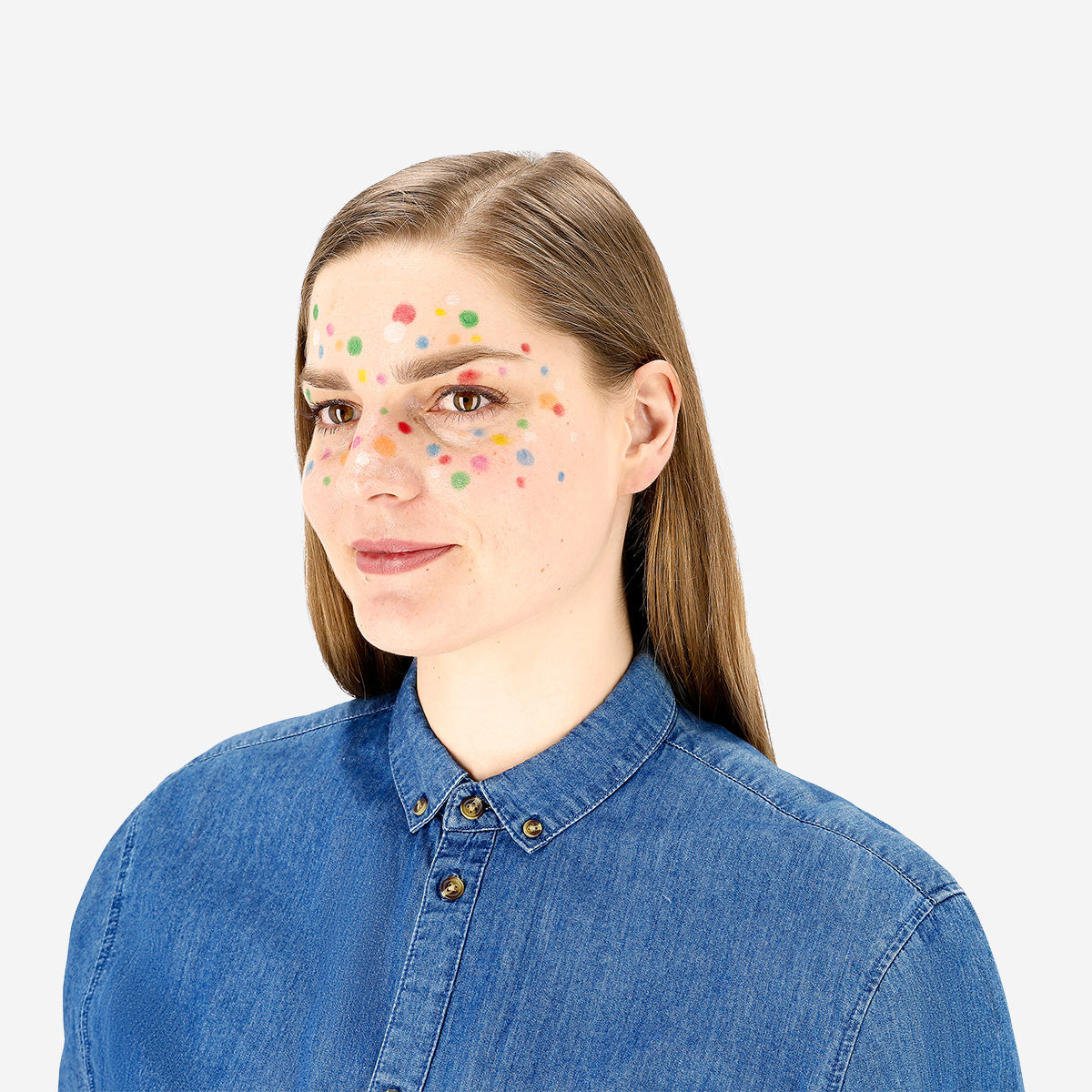 Eight colorful face paint crayons in a plastic case, used for creative personal care and face decoration by Flying Tiger Copenhagen.