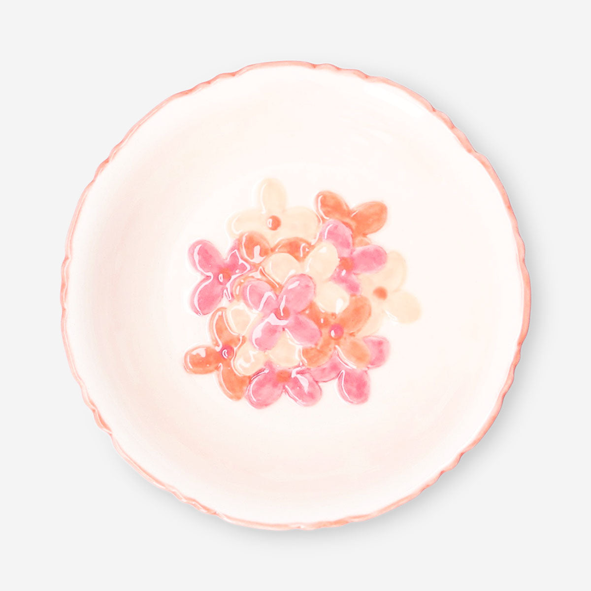 Ceramic kitchen bowl with hand-painted flower design, 12 cm diameter, by Flying Tiger Copenhagen.