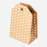 Office gift bag from Flying Tiger Copenhagen with Manila tag featuring a heart print, perfect for special occasions.