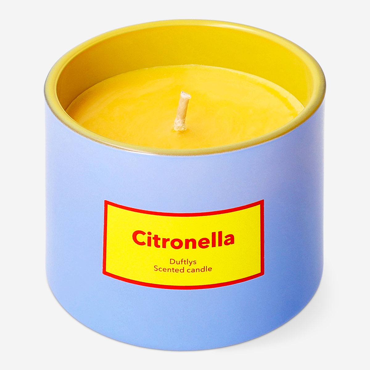 Flying Tiger Copenhagen scented outdoor candle with citronella fragrance, in a white glass holder, ideal for patio or garden use.