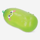 Flying Tiger Copenhagen Pickle Press Me toy gadget with a colorful, squeezable pickle character for fun and stress relief.