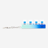 Flying Tiger Copenhagen clicking keyring toy with light, compact gadget featuring a fun, illuminated clicking mechanism.
