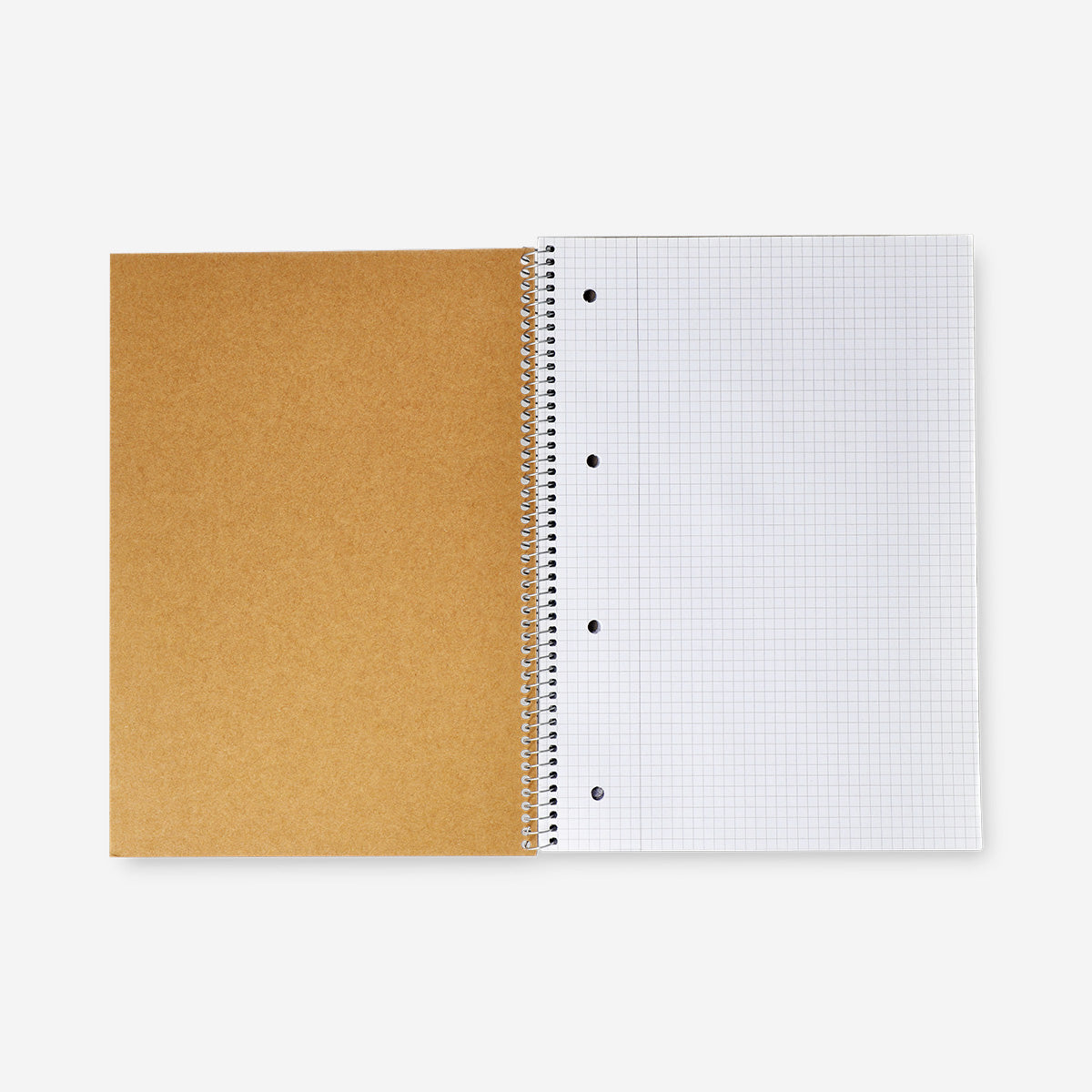 A4 spiral-bound grid notebook with a craft paper cover from Flying Tiger Copenhagen, open to blank grid pages.