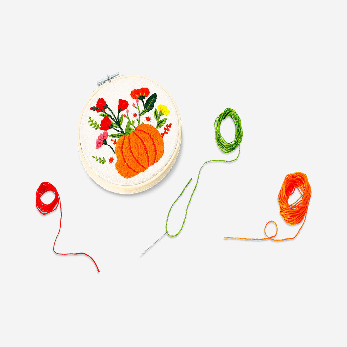 Embroidery kit with autumnal print from Flying Tiger Copenhagen featuring colorful threads and fabric for hobby craft projects.