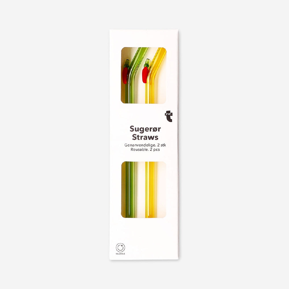 Two glass straws with colorful chilli decorations, designed for kitchen use by Flying Tiger Copenhagen.