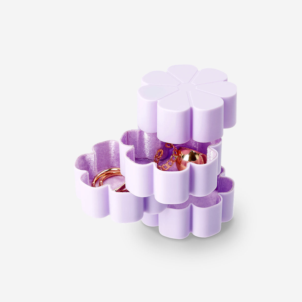 Purple flower jewelry box from Flying Tiger Copenhagen, with a floral design and personal care storage inside.