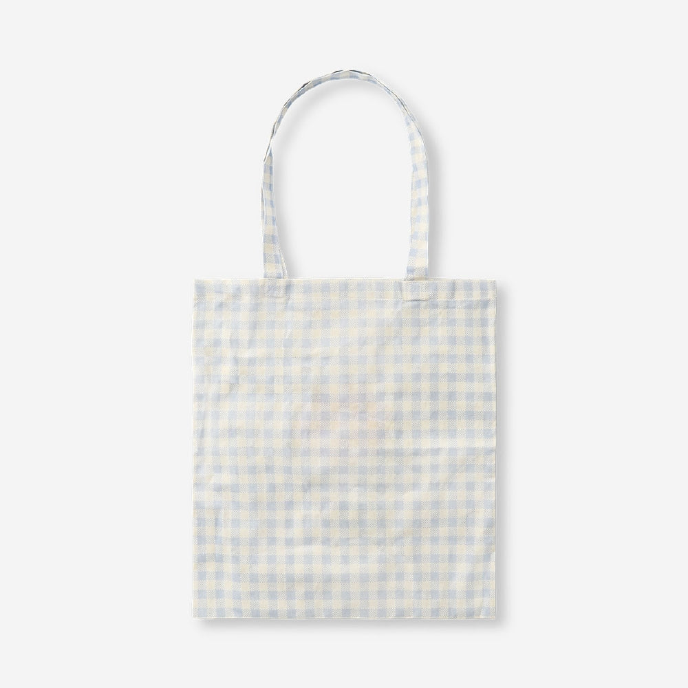 Flying Tiger Copenhagen floral and check print tote bag made of textile with colorful flower and check pattern.