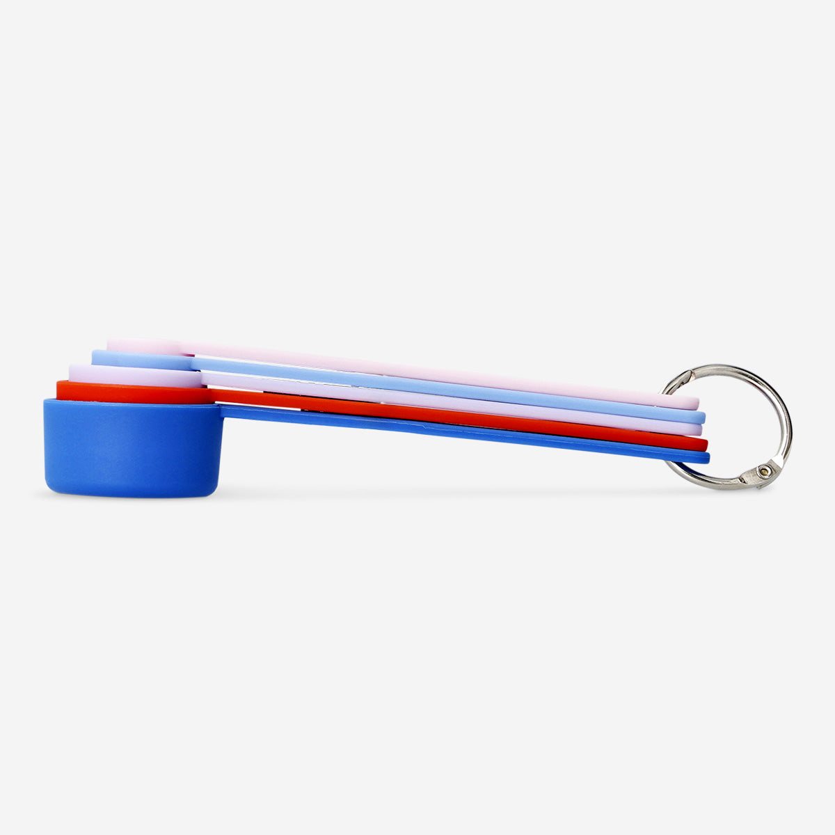 Set of four Flying Tiger Copenhagen designer kitchen measuring spoons for accurate cooking and baking measurements.
