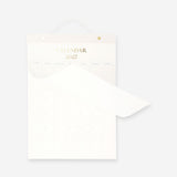 Monthly hanging 2027 office calendar by Flying Tiger Copenhagen featuring colorful pages and a compact design for workspace.
