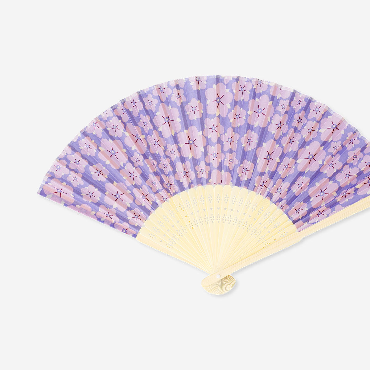 Foldable bamboo fan with purple floral textile pattern by Flying Tiger Copenhagen, showing detailed fabric and wooden handle.