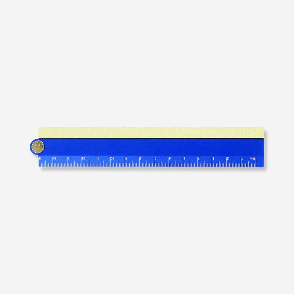 Foldable metal ruler with stencils from Flying Tiger Copenhagen, suitable for office use, featuring measurement markings and stencil designs.