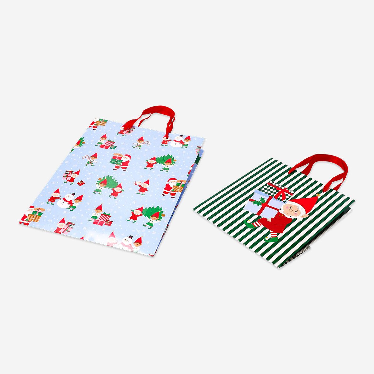 Two office gift bags with festive elf print designs by Flying Tiger Copenhagen, perfect for holiday gift wrapping.