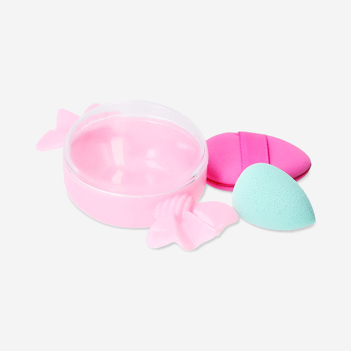 Three mini makeup blender sponges in a colorful hard candy box, branded Flying Tiger Copenhagen, for precise makeup application.