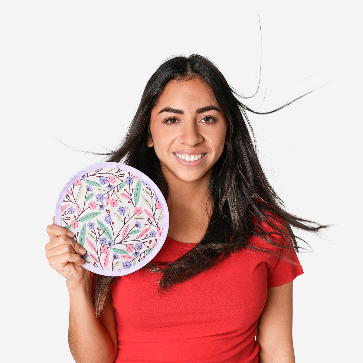 Multicolored floral foldable textile fan by Flying Tiger Copenhagen, featuring vibrant flower patterns and compact design.