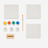 Set of three DIY ceramic tiles from Flying Tiger Copenhagen, featuring colorful patterns for craft projects and home decor.