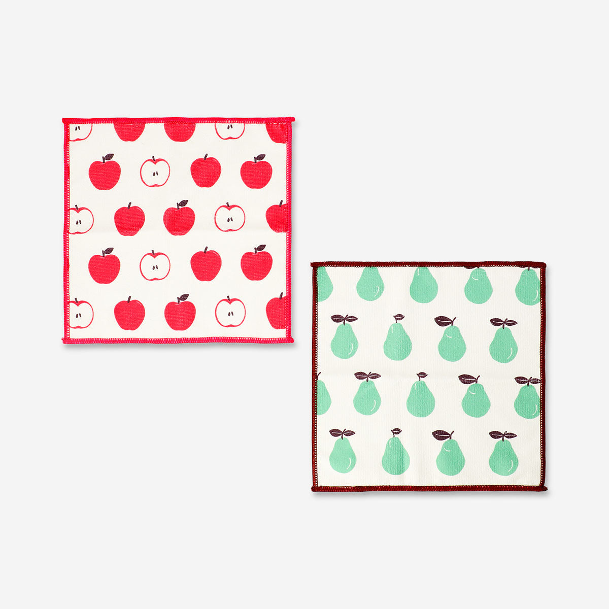 Set of two Flying Tiger Copenhagen kitchen cloths with colorful fruit print, perfect for cleaning and food prep.