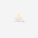 Set of four white LED tealights from Flying Tiger Copenhagen, ideal for home decor and ambient lighting.