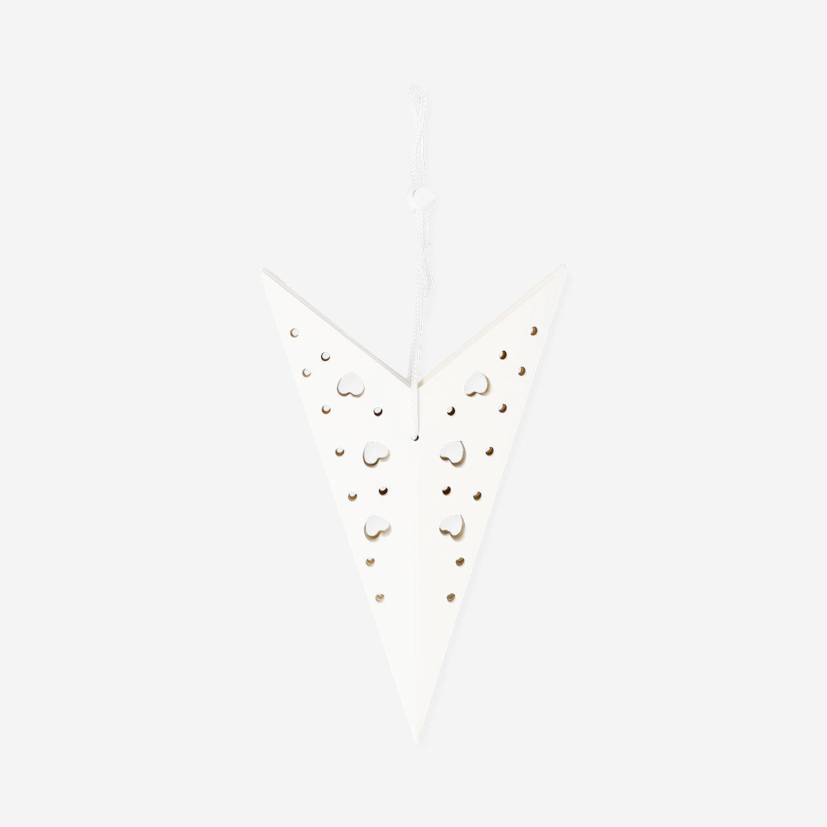 White glowing paper star for home decor by Flying Tiger Copenhagen, illuminated and hanging against a neutral background.