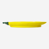 Lemon-shaped 14 cm ceramic serving plate by Flying Tiger Copenhagen, ideal for serving appetizers or snacks in the kitchen.