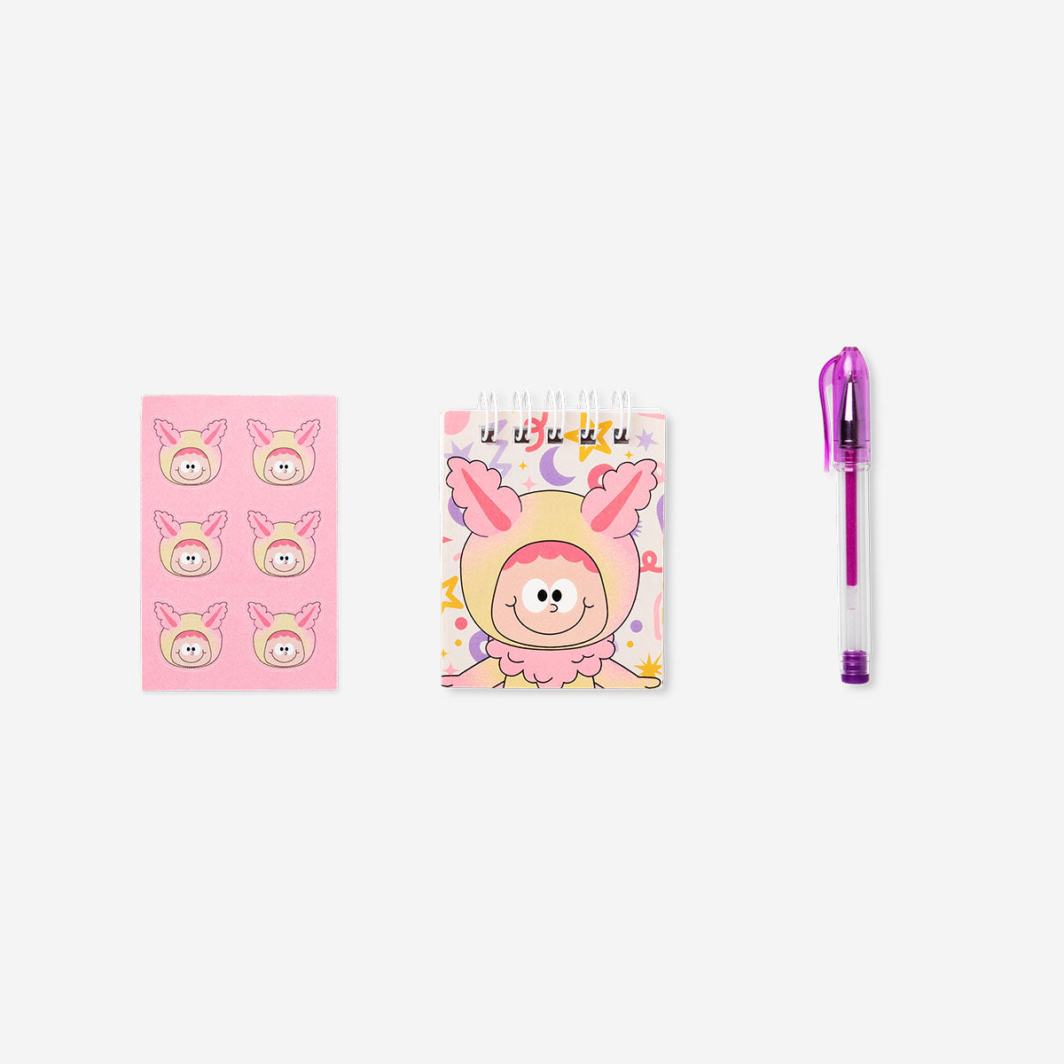 Colorful Candy Monster pouch stationery kit from Flying Tiger Copenhagen with pens, pencils, and office supplies inside.
